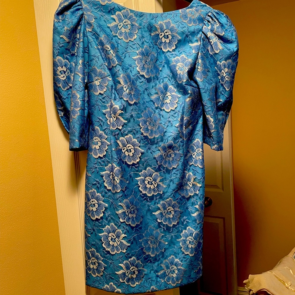 Beautiful blue lace prom or bridesmaid dress above the knee